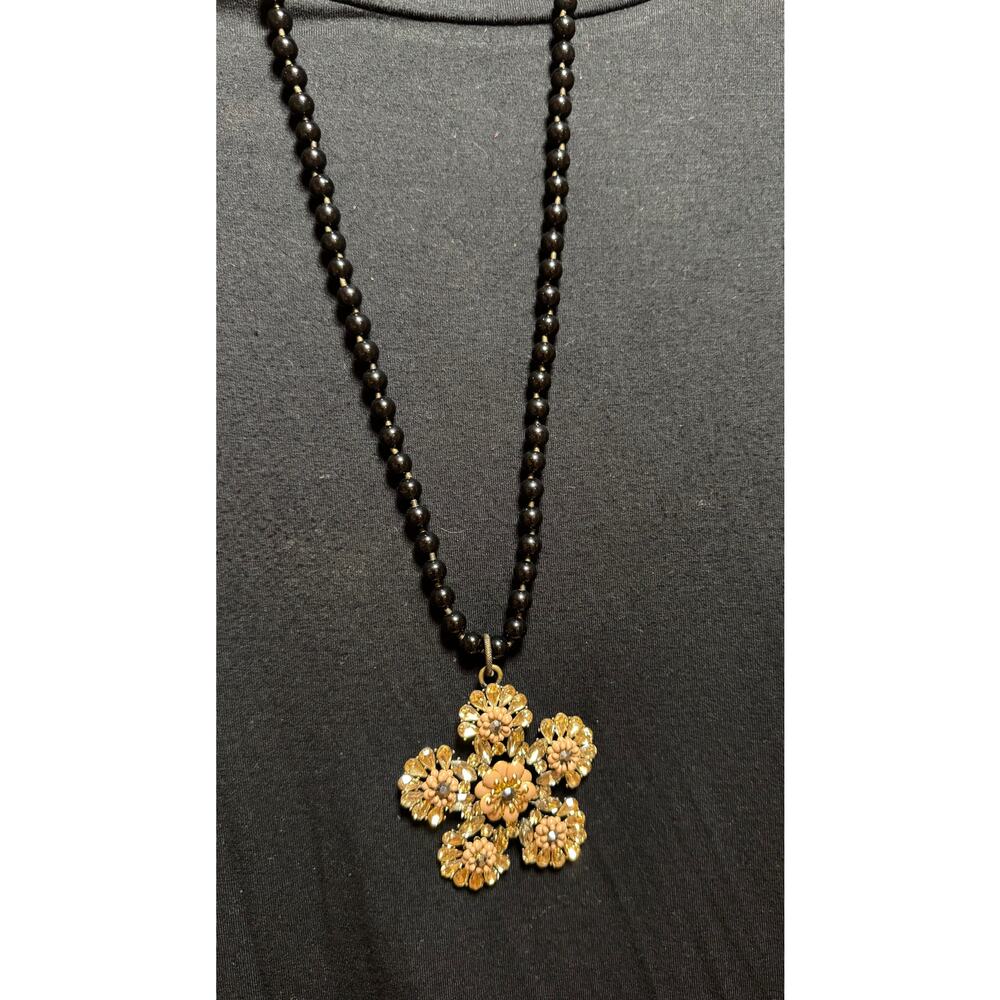 Y58  Gold Colored Flower on long black bead necklace